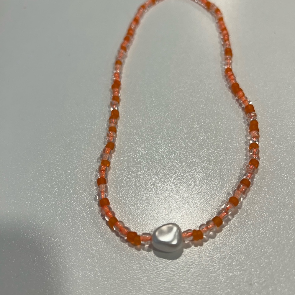 Chic Orange Beaded Necklace with Heart Charm